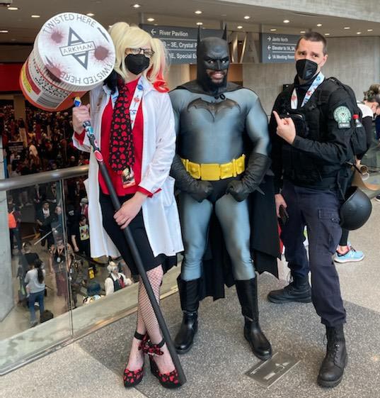 Gotham PD SWAT at New York Comic Con 2022.  Batman is Andrew Bridges.  Harley Quinn is VillainessByNight.